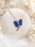 Détail collier Naturalia Hypochrysops bleu roi – aile papillon irisée fait main Hérault