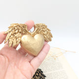 Coeur sacré ex voto avec ailes d'ange doré