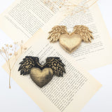 Deux décoration murale coeur sacré ex voto avec ailes d'ange vintage