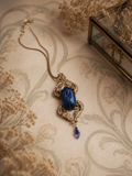 Collier Râ porté – grand médaillon bijou Égypte antique fait main | Victorian Rehab