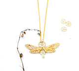 "Flyingwheels" necklace - gold